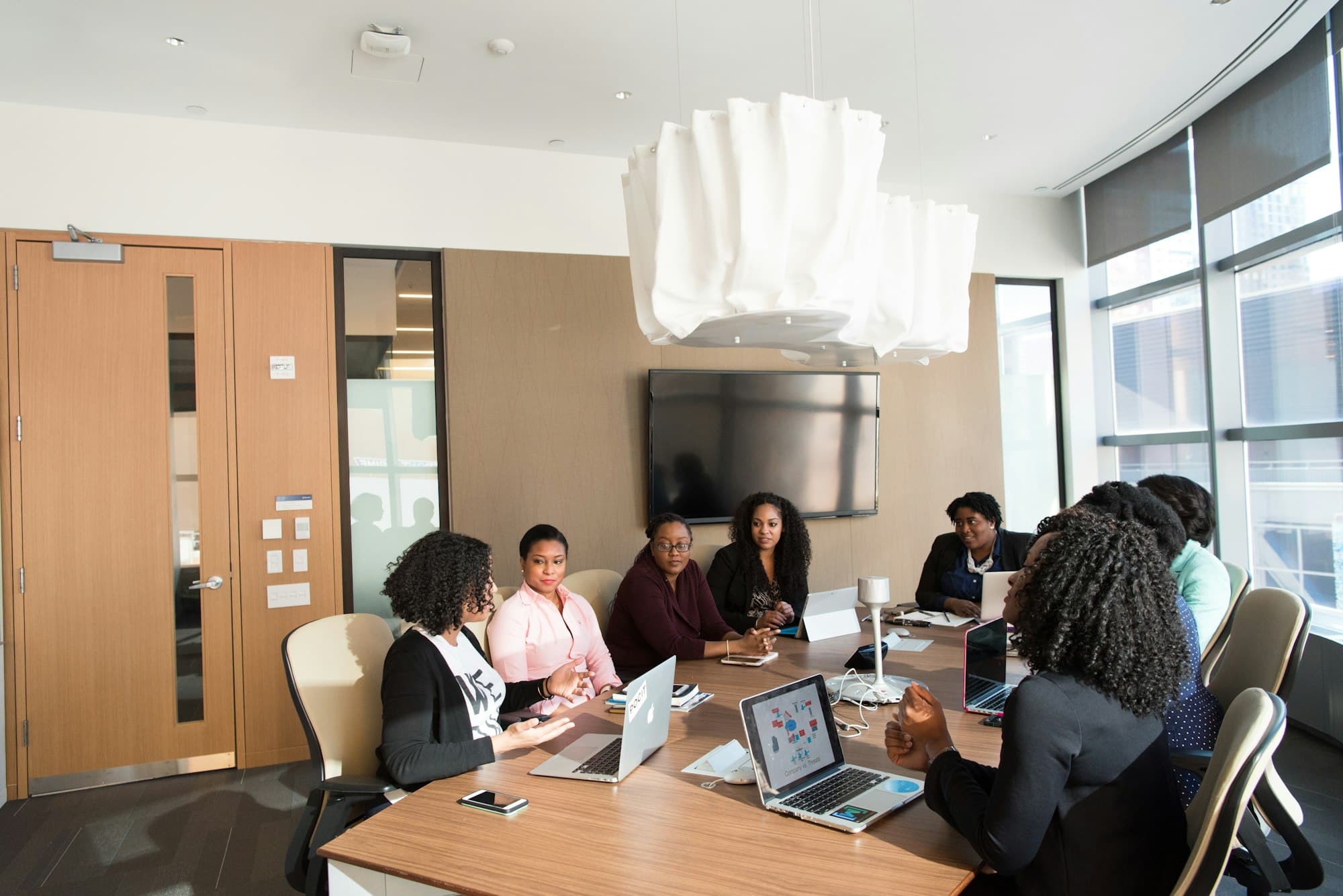 A team of professionals working together in a bright office